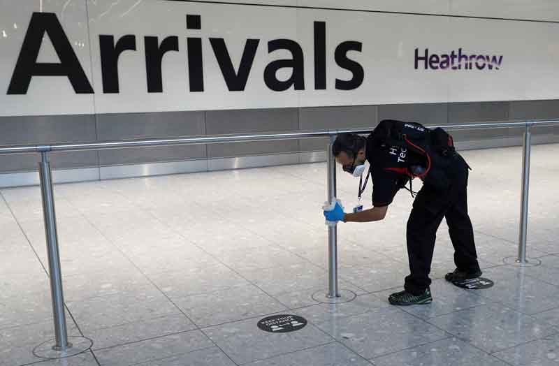 2021-08-26T171421Z_1_LYNXMPEH7P0TN_RTROPTP_4_HEALTH-CORONAVIRUS-BRITAIN-TRAVEL.JPG