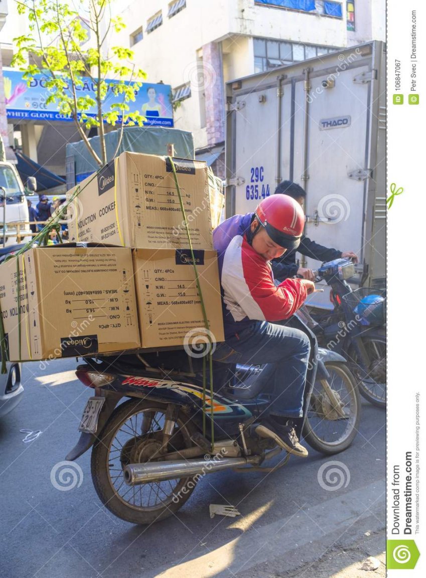 delivery-man-hanoi-bike-delivery-man-riding-motorcycle-checks-his-load-busy-street-hanoi-vietnam-106847067.thumb.jpg.368b3fb4505074813ec1d4e6a6857d77.jpg