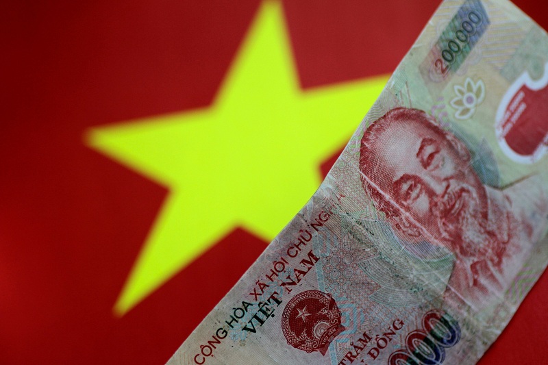 2021-10-09T043239Z_1_LYNXMPEH98014_RTROPTP_4_USA-VIETNAM-CURRENCY.JPG