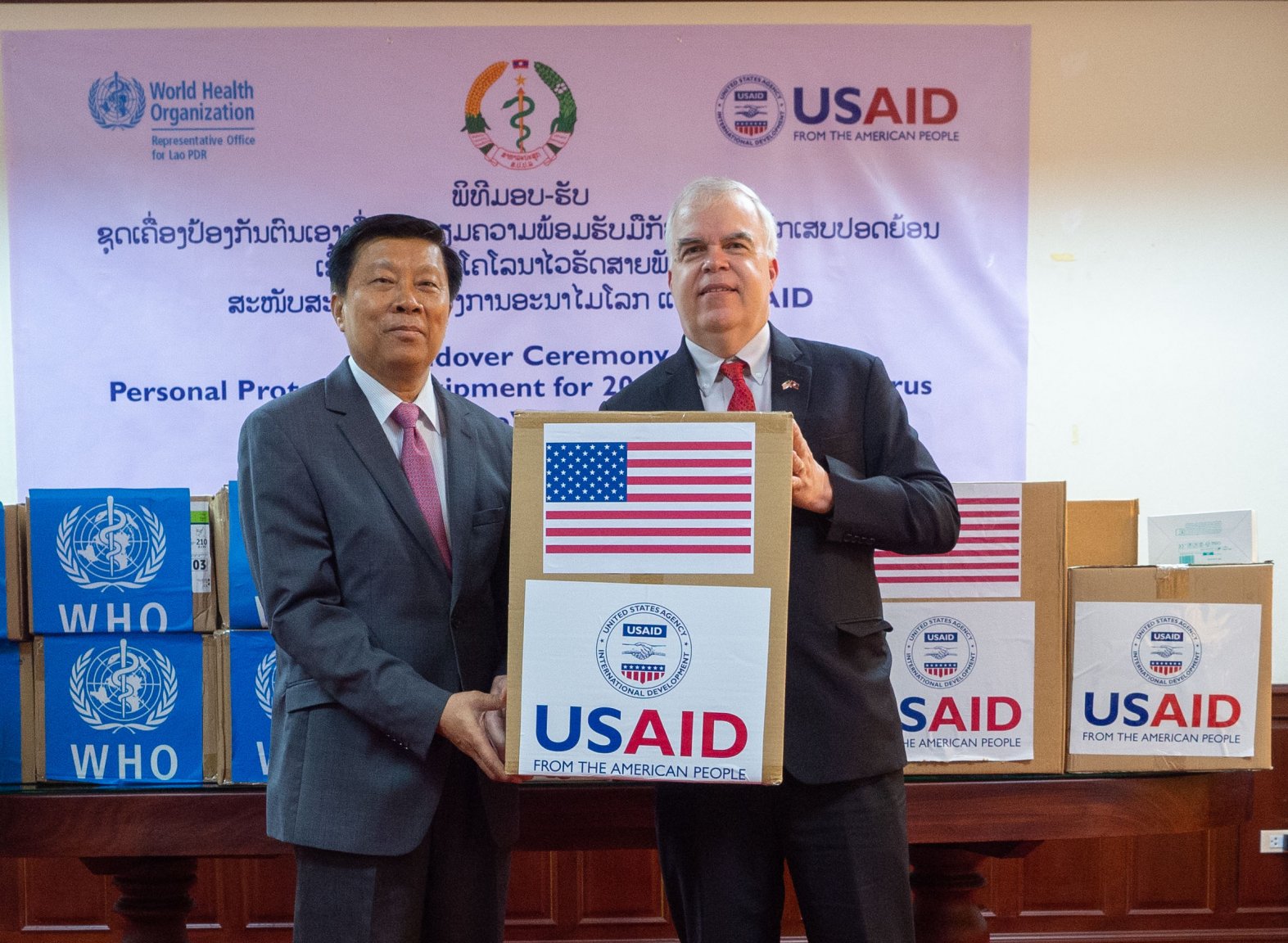 Handover_of_PPE_in_Laos_by_AMB_Haymond_to_Deputy_Minister_Phouthone_Muongpak-1-2.jpg