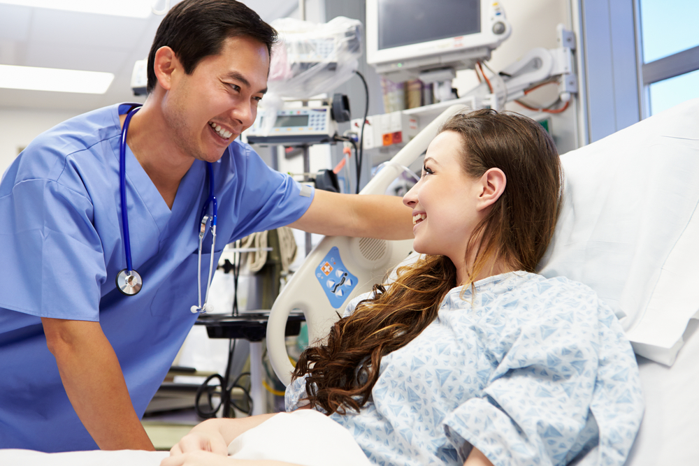 Nurse-and-Patient.jpg.9072f8cfb4cfa3e2c2baa5f6ce481365.jpg