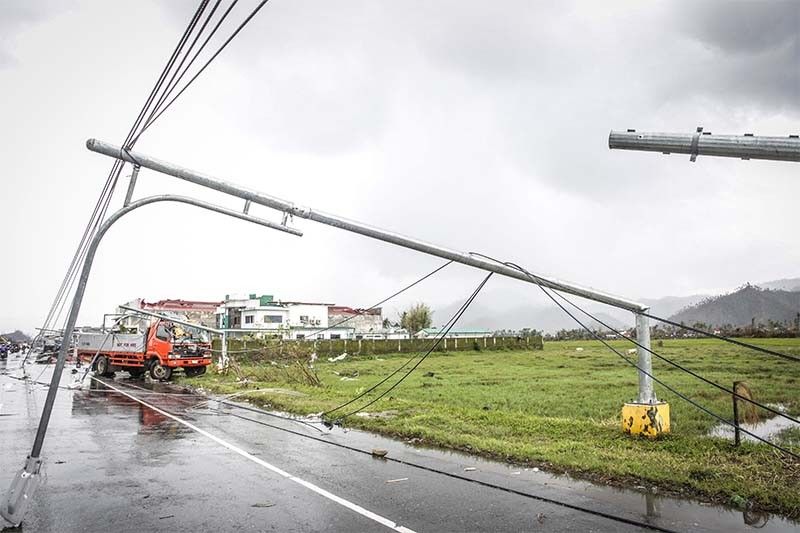 afp-fallen-electric-post-surigao-odette_2021-12-21_12-06-30.jpg