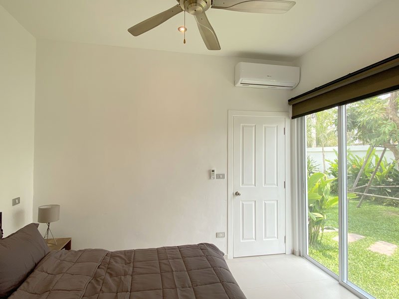 Both bedrooms - here the smaller one - have great views and en-suite bathrooms.jpg