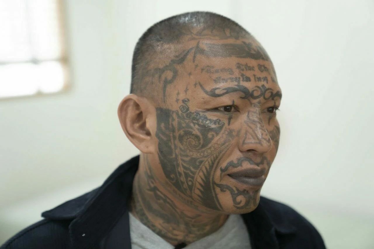 Tattooed Thai gangster-turned-movie star arrested on gambling charges ...