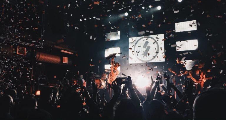 A-band-playing-music-in-a-night-club.-Photo-Unsplash-e1697979046554.jpg