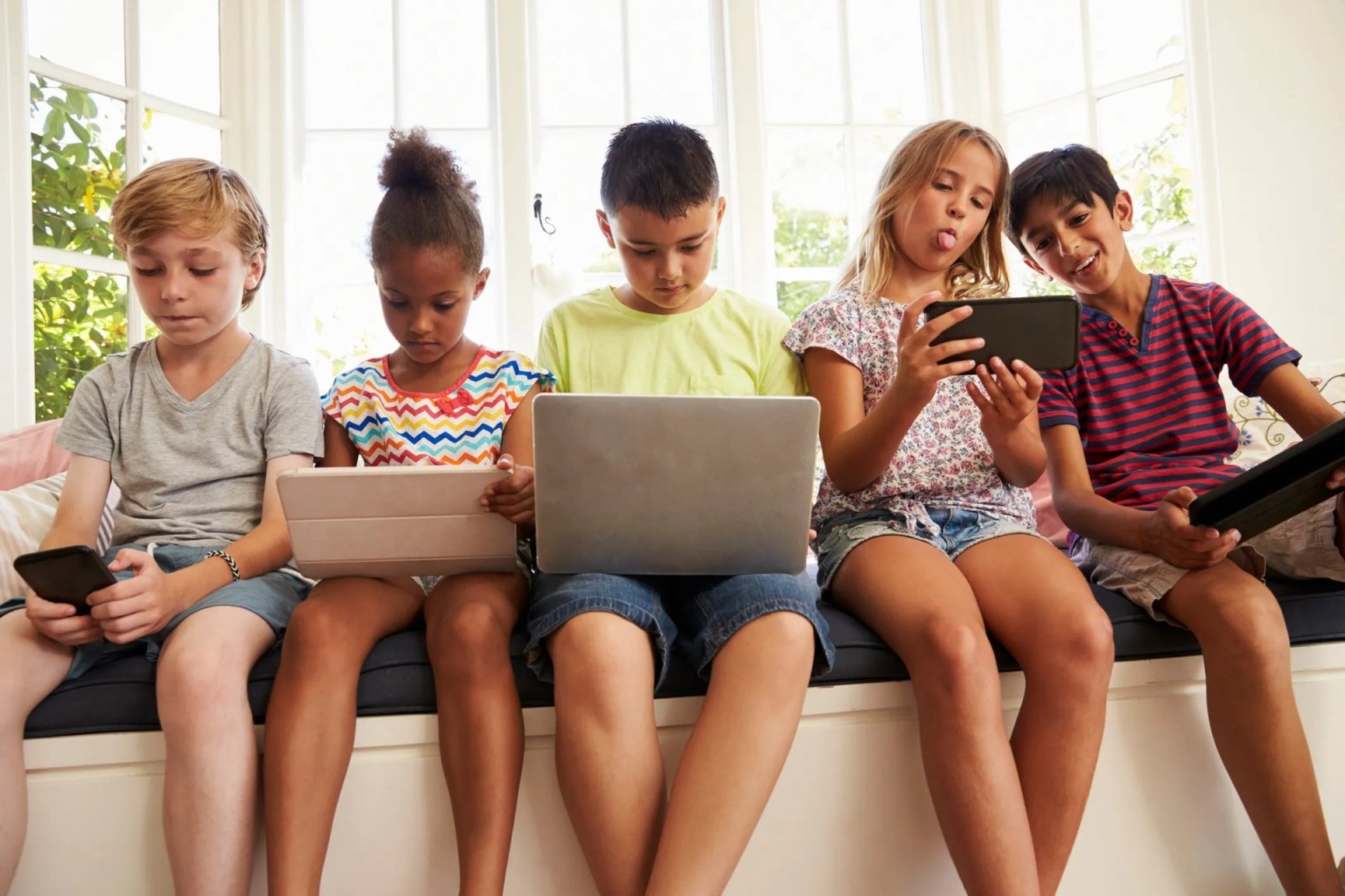 children-using-technology-619371154.jpg