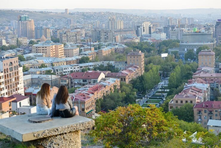 two-girls-sit-chat-enjoy-view-yerevan-city-armenia_928017-413.jpg