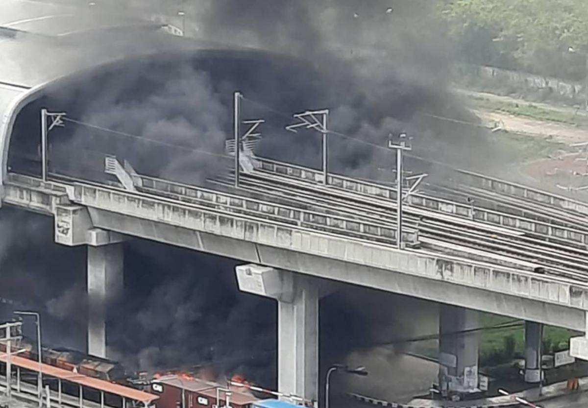 Bus Hit by Train Near Rama 9 Bursts Into Flames