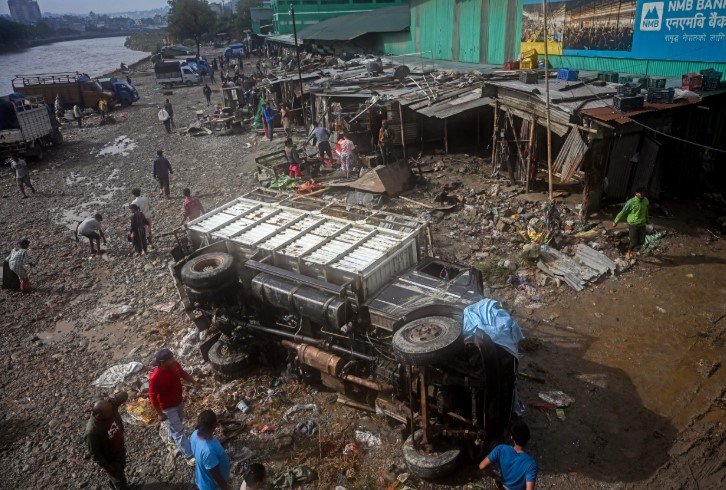 Nepal's flood nightmare deepens, bodies pile up and fresh warnings