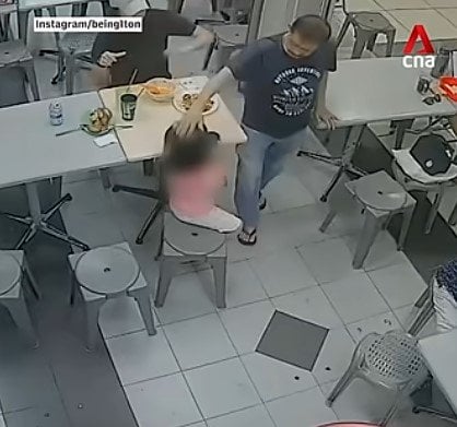 Singapore police investigate assault after a man patted a child's head