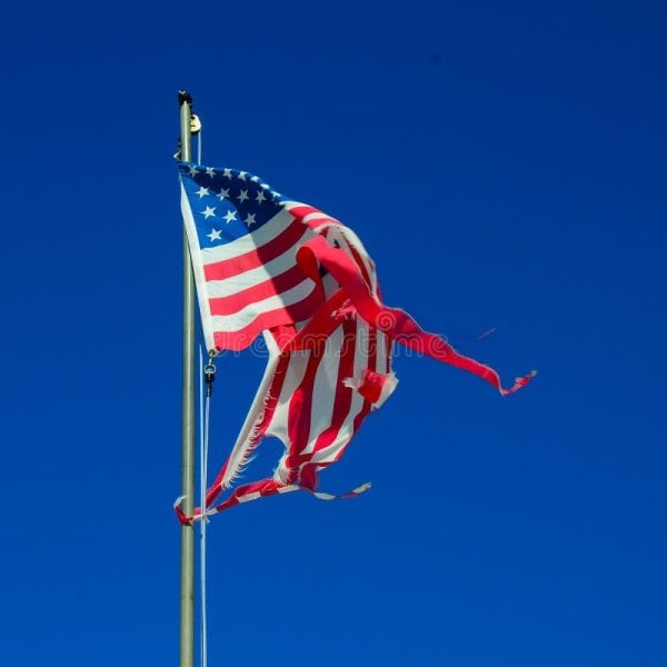 tattered-twisted-american-flag-worn-shredded-flapping-wind-51759966.jpg
